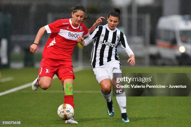 Sofia Cantore of Juventus Women is challenged during the serie A match between Juventus Women and Pink Bari at Juventus Center Vinovo on March 17,...