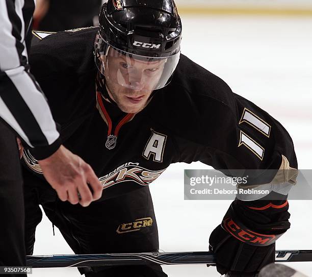 Saku Koivu of the Anaheim Ducks waits for the puck drop during a face off during the game against the Carolina Hurricanes on November 25, 2009 at...