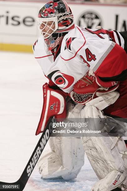 Manny Legace of the Carolina Hurricanes waits in the crease against the Anaheim Ducks during the game on November 25, 2009 at Honda Center in...