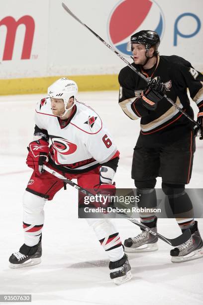 Tim Gleason of the Carolina Hurricanes defends against Bobby Ryan of the Anaheim Ducks during the game on November 25, 2009 at Honda Center in...