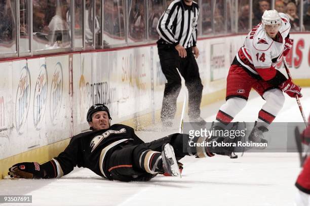 James Wisniewski of the Anaheim Ducks falls to the ice during the game against the Carolina Hurricanes on November 25, 2009 at Honda Center in...