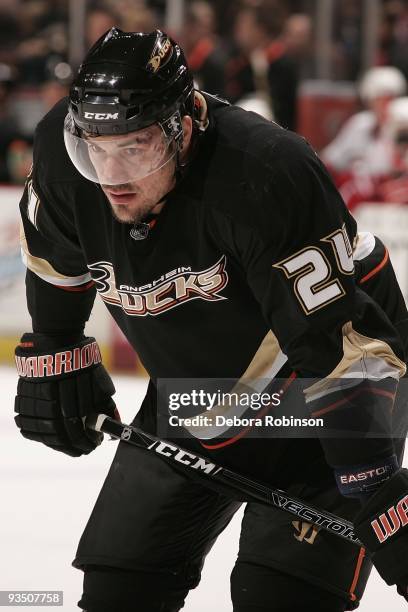 Evgeny Artyukhin of the Anaheim Ducks waits on the ice during a face off during the game against the Carolina Hurricanes on November 25, 2009 at...