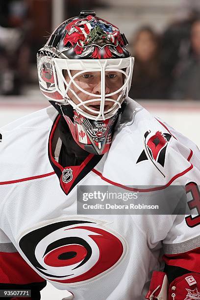 Manny Legace of the Carolina Hurricanes waits in the crease against the Anaheim Ducks during the game on November 25, 2009 at Honda Center in...