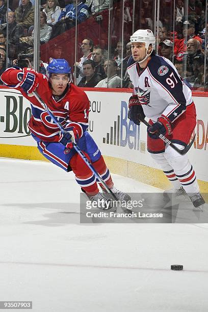 Mike Cammalleri of the Montreal Canadiens skates for the puck during the game against Columbus Blue Jacket on November 24, 2009 at the Bell Centre in...