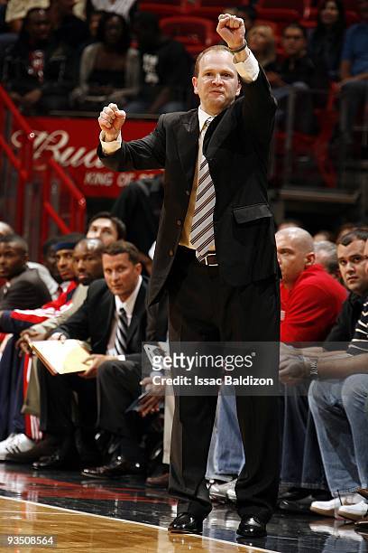 Head coach Lawrence Frank of the New Jersey Nets calls a play from the sideline during the game against the Miami Heat at American Airlines Arena on...