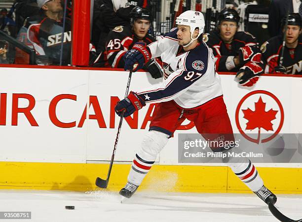 Rostislav Klesla of the Columbus Blue Jackets passes the puck against the Ottawa Senators during their game at Scotiabank Place on November 26, 2009...