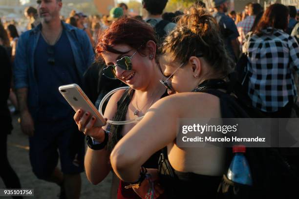 Fans take a selfie during the third day of Lollapalooza Chile 2018 at Parque O'Higgins on March 18, 2018 in Santiago, Chile.