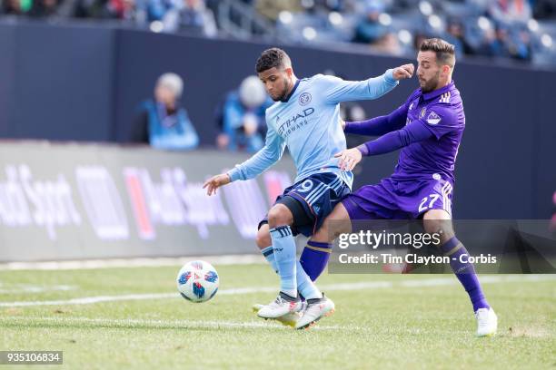 March 11: Ismael Tajouri of New York City challenged by RJ Allen of Orlando City during the New York City FC Vs Orlando City SC regular season MLS...