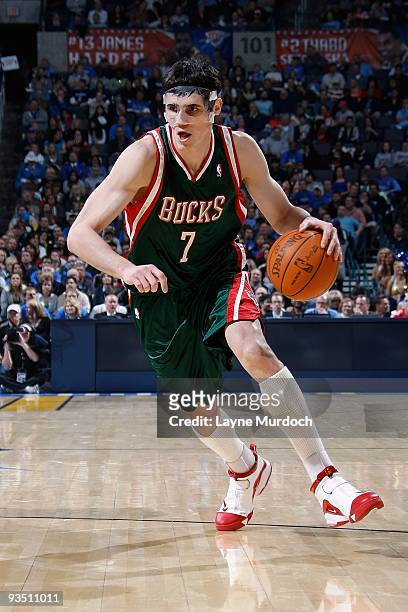 Ersan Ilyasova of the Milwaukee Bucks drives the ball against the Oklahoma City Thunder during the game on November 27, 2009 at the Ford Center in...
