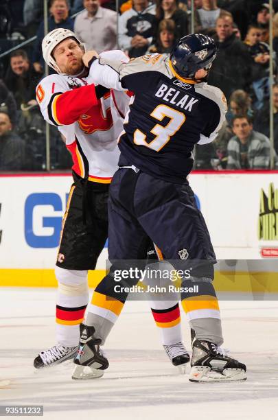 Wade Belak of the Nashville Predators fights Brian McGrattan of the Calgary Flames on November 30, 2009 at the Sommet Center in Nashville, Tennessee.