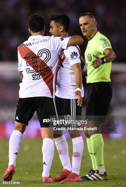 Ignacio Scocco of River Plate celebrates with teammate Gonzalo Martinez after scoring the second goal of his team during a match between River Plate...