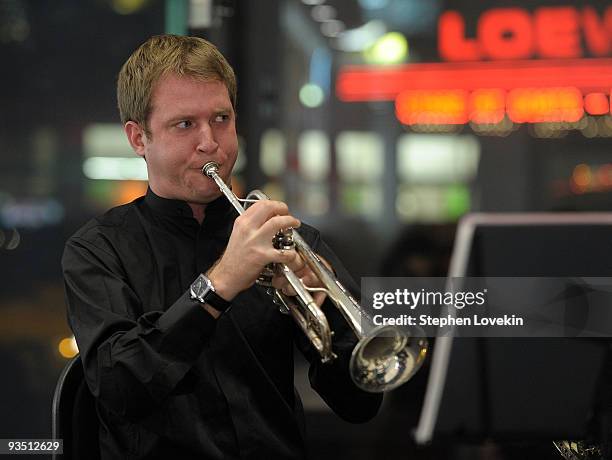 Associate principal trumpet player Matthew Muckey of The New York Philharmonic Principal Brasss Quintet perform at the Apple Store - Upper West Side...