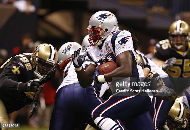 Laurence Maroney of the New England Patriots runs for a 2-yard touchdown during the third quarter of the game against the New Orleans Saints at...