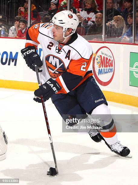 Mark Streit of the New York Islanders skates against the New Jersey Devils at the Prudential Center on November 28, 2009 in Newark, New Jersey.