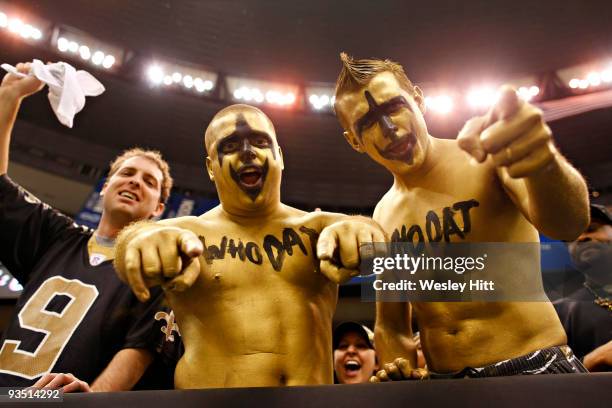 Fans of the New Orleans Saints celebrate a win over the New England Patriots at the Louisiana Superdome on November 30, 2009 in New Orleans,...