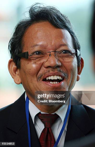 Zakariah Abdul Rashid, deputy director of the Malaysian Institute of Economic Research , speaks to the media at the National Economic Outlook...