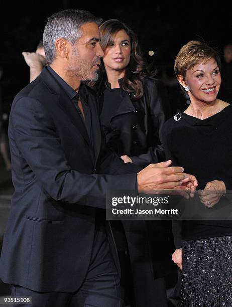 Elisabetta Canalis , actor George Clooney, and his mother Nina Warren Clooney, arrive at the premiere of Paramount Pictures' 'Up In The Air' held at...