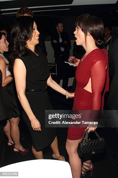 Lucy Liu and Christina Ricci attend 'The Art of Progress' World-premiere of the new Audi A8 at the Audi Pavilion on November 30, 2009 in Miami,...