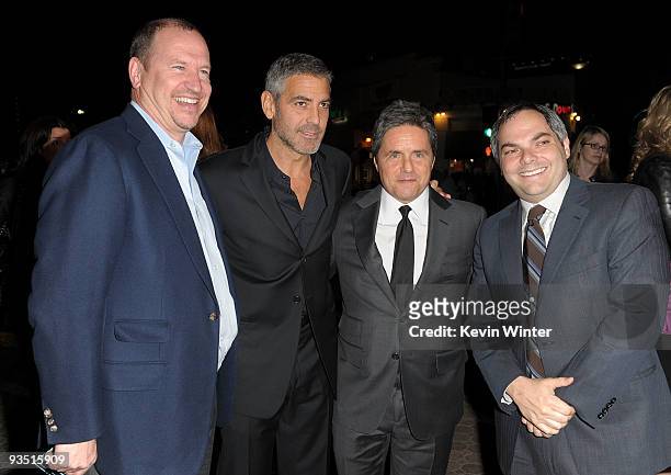Paramount's Rob Moore, actor George Clooney, CEO of Paramount Pictures Brad Grey, and Paramount's Adam Goodman arrive at the premiere of Paramount...
