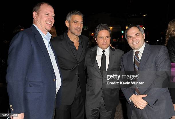 Paramount's Rob Moore, actor George Clooney, CEO of Paramount Pictures Brad Grey, and Paramount's Adam Goodman arrive at the premiere of Paramount...