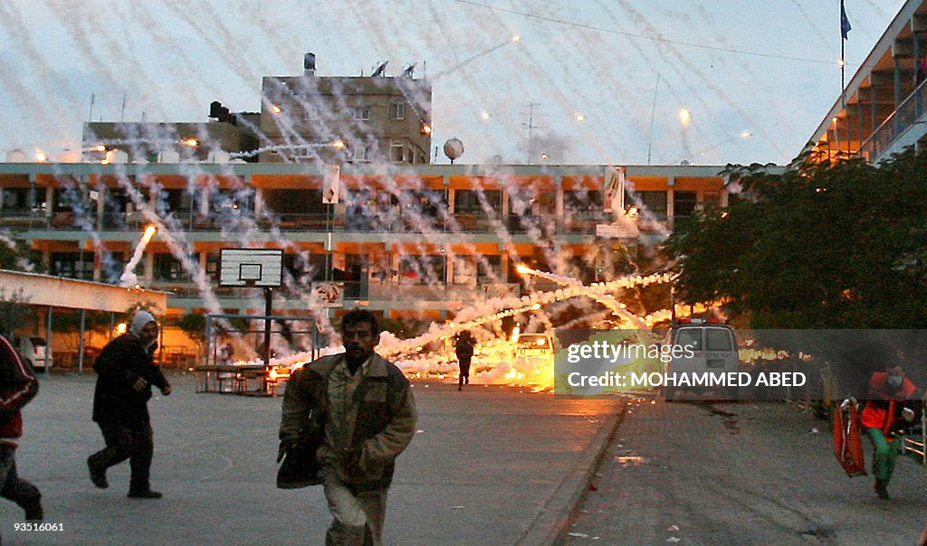 Palestinian civilians and medics run to