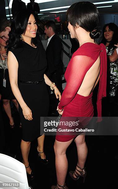 Actors Lucy Liu and Christina Ricci attends 'The Art of Progress' world premiere of the new Audi A8 at the Audi Pavilion on November 30, 2009 in...