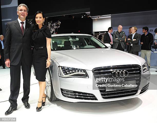 Rupert Stadler and Lucy Liu attends 'The Art of Progress' world premiere of the new Audi A8 at the Audi Pavilion on November 30, 2009 in Miami,...