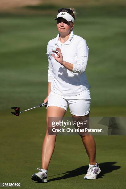 Nanna Koerstz Madsen of Denmark reacts to a putt on the 17th green during the third round of the Bank Of Hope Founders Cup at Wildfire Golf Club on...