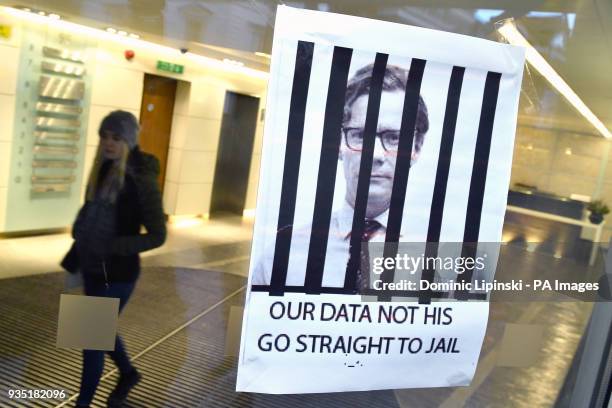 Sign put up by a protestor at the offices of Cambridge Analytica in central London, as the data watchdog is to apply for a warrant to search...