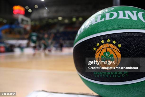 Players of Panathinaikos Superfoods Athen warm up at the background of a team's ball before the 2017/2018 Turkish Airlines EuroLeague Regular Season...