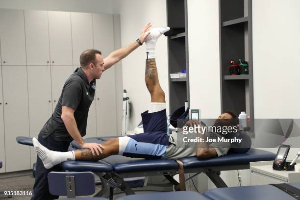 Ben McLemore of the Memphis Grizzlies gets treatment before the game against the Denver Nuggets on March 17, 2018 at FedExForum in Memphis,...