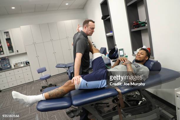 Ben McLemore of the Memphis Grizzlies gets treatment before the game against the Denver Nuggets on March 17, 2018 at FedExForum in Memphis,...