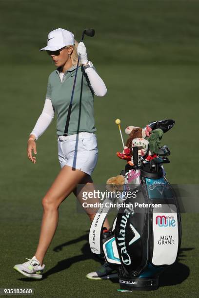 Michelle Wie takes a club from her bag during the third round of the Bank Of Hope Founders Cup at Wildfire Golf Club on March 17, 2018 in Phoenix,...