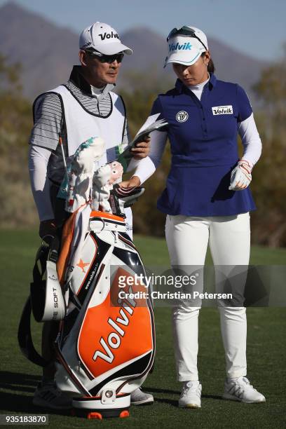 Chella Choi of South Korea takes a club from her bag during the third round of the Bank Of Hope Founders Cup at Wildfire Golf Club on March 17, 2018...
