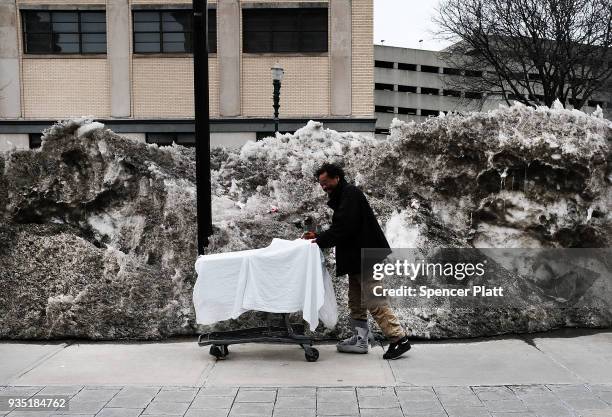 Homeless man walks an economically stressed section of the city on March 20, 2018 in Worcester, Massachusetts. Worcester, once a thriving...