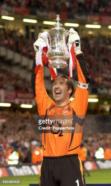 Arsenal captain and goalkeeper David Seaman lifts the FA Cup following their 1-0 victory over Southampton in the FA Cup Final between Arsenal and...