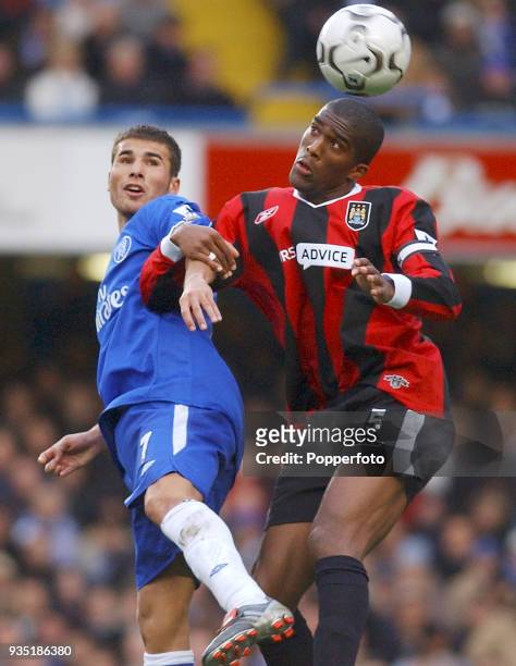 Adrian Mutu of Chelsea and Sylvain Distin of Manchester City in action during the FA Barclaycard Premiership match between Chelsea and Manchester...