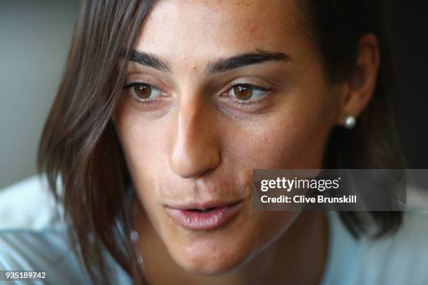 Caroline Garcia of France speaks to the press at the media all access hour during the Miami Open Presented by Itau at Crandon Park Tennis Center on...