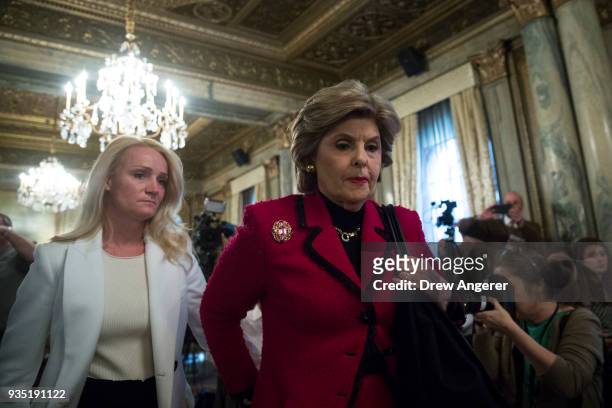 Rocxanne Deschamps and her attorney Gloria Allred arrive for a press conference at the Lotte New York Palace Hotel, March 20, 2018 in New York City....
