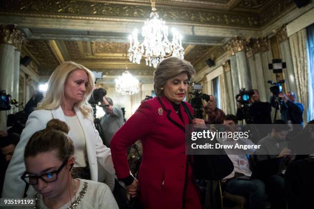 Rocxanne Deschamps and her attorney Gloria Allred arrive for a press conference at the Lotte New York Palace Hotel, March 20, 2018 in New York City....