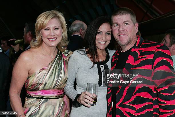 Kerri-Anne Kennerley , golfer John Daly and his partner pose during the Australian Open Gala Cocktail Function at the Sydney Opera House on December...