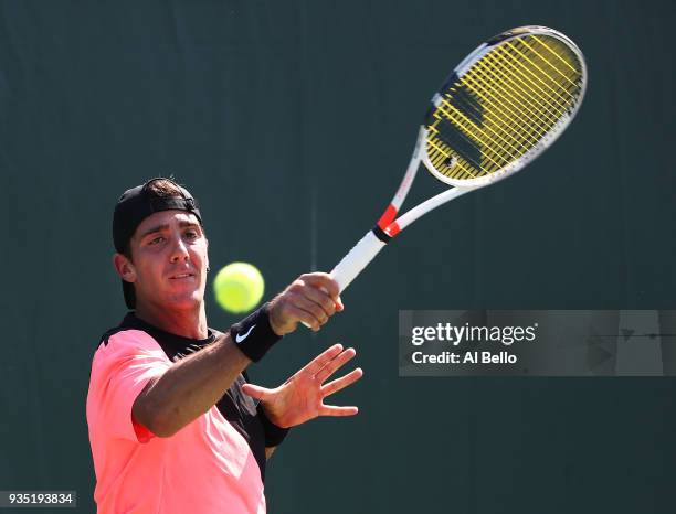 Thanasi Kokkinakis of Australia plays a shot against Daniel Taro of JapanThanasi Kokkinakis of Australia during Day 2 of the Miami Open at the...