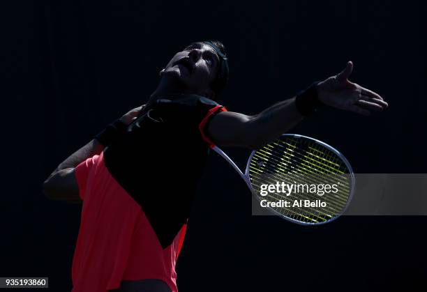 Thanasi Kokkinakis of Australia serves against Daniel Taro of JapanThanasi during Day 2 of the Miami Open at the Crandon Park Tennis Center on March...