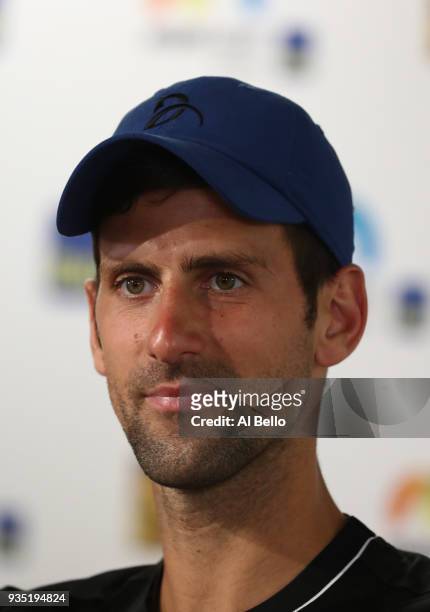 Novak Djokovic of Serbia speaks to the press during Day 2 of the Miami Open at the Crandon Park Tennis Center on March 19, 2018 in Key Biscayne,...