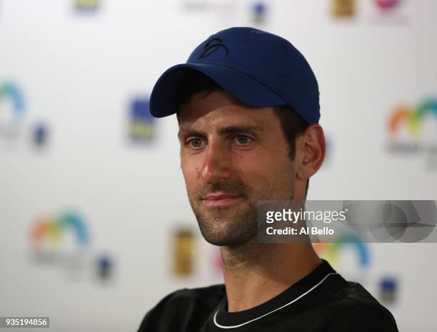 Novak Djokovic of Serbia speaks to the press during Day 2 of the Miami Open at the Crandon Park Tennis Center on March 19, 2018 in Key Biscayne,...