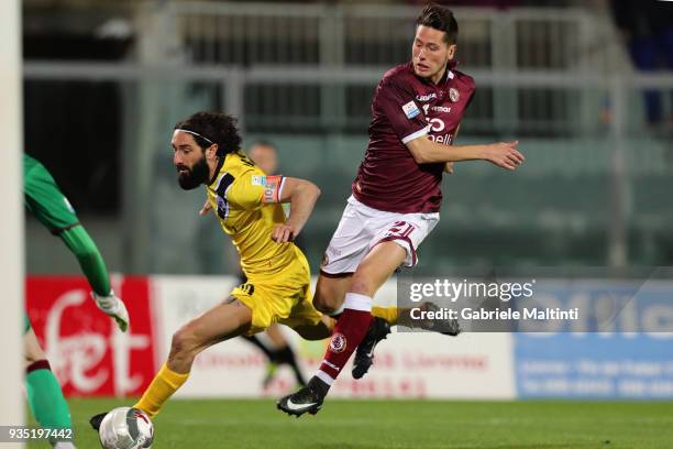 Gabriele Perico of AS Livorno Calcio battles for the ball with Alessandro Marotta of AC Siena during the Serie C match between AS Livorno and AC...