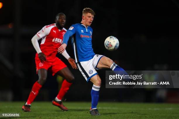 Toumani Diagouraga of Fleetwood Town and Andy Cannon of Rochdale during the Sky Bet League One match between Rochdale and Fleetwood Town at Spotland...