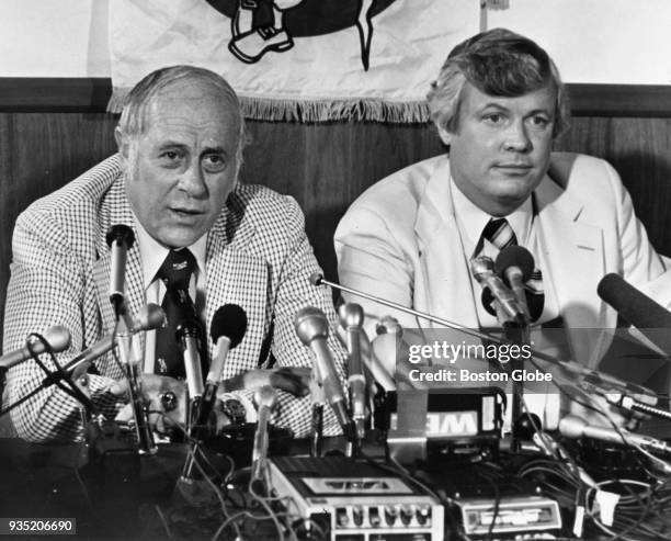 Boston Celtics coach Red Auerbach, left, and John Y. Brown Jr., the new owner of the Boston Celtics, speak during a press conference at the Boston...