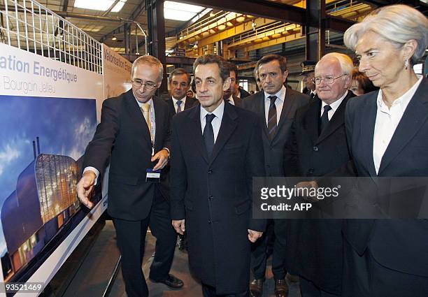 French President Nicolas Sarkozy visits the industrial group CNIM with French Economy Minister Christine Lagarde and president of the Provence Alpes...
