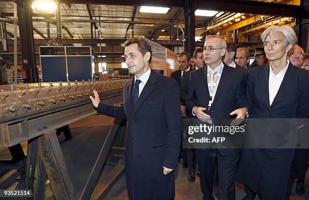 French President Nicolas Sarkozy visits the industrial group CNIM with French Economy Minister Christine Lagarde , on December 1, 2009 in La...